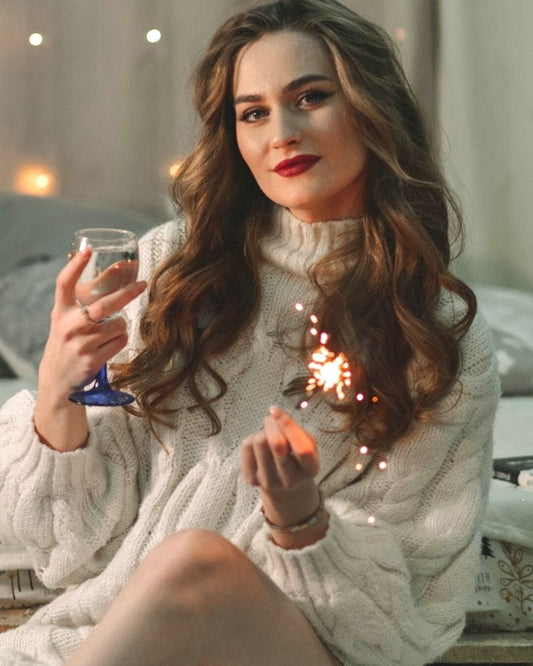 Woman With Nice Skin Holding Wine Glass And Sparkler